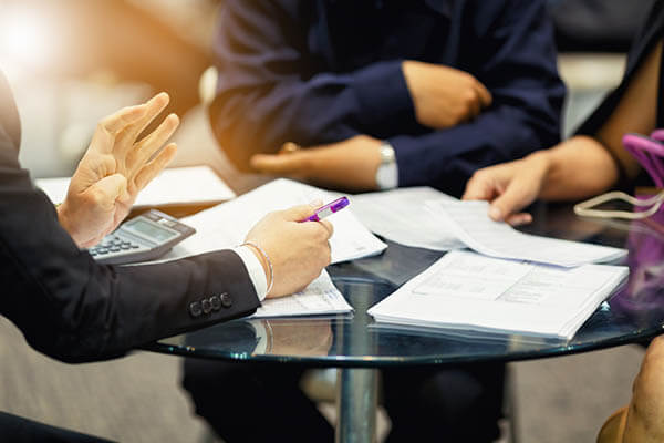 What Are the Pros and Cons of Hiring a Workers’ Comp Attorney?